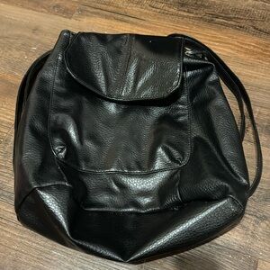 Great used condition unknown leather mini backpack.